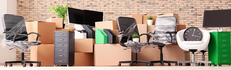 Spina’s Moving Services team packing a commericial/office environment.
